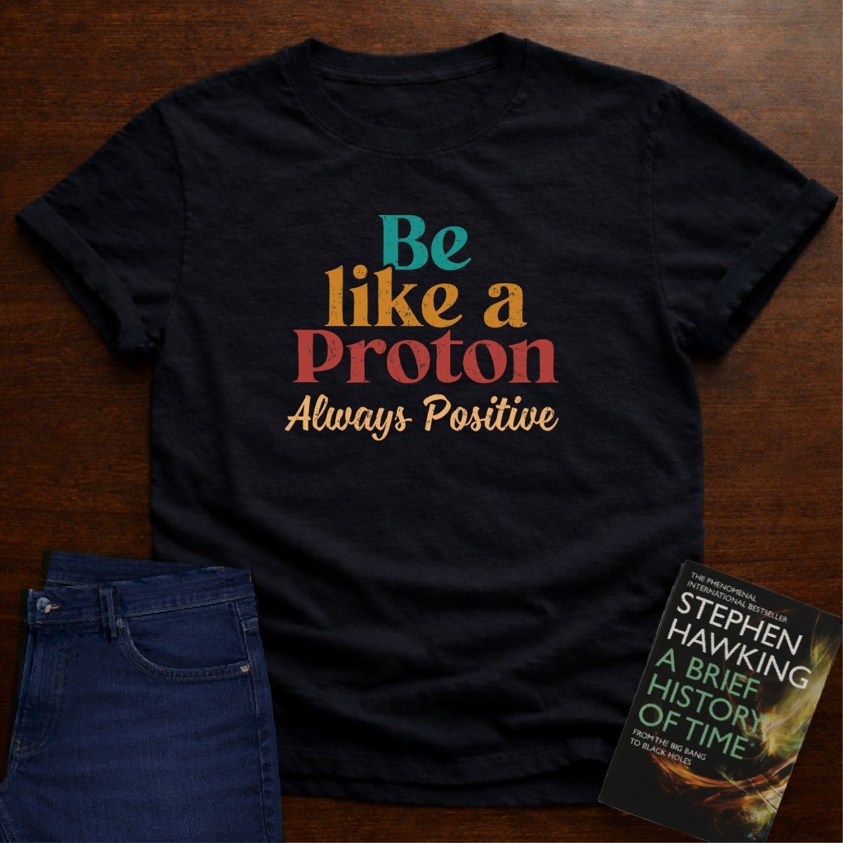 "Be Like a Proton" - Physics T-shirt 🧪⚡ – Black